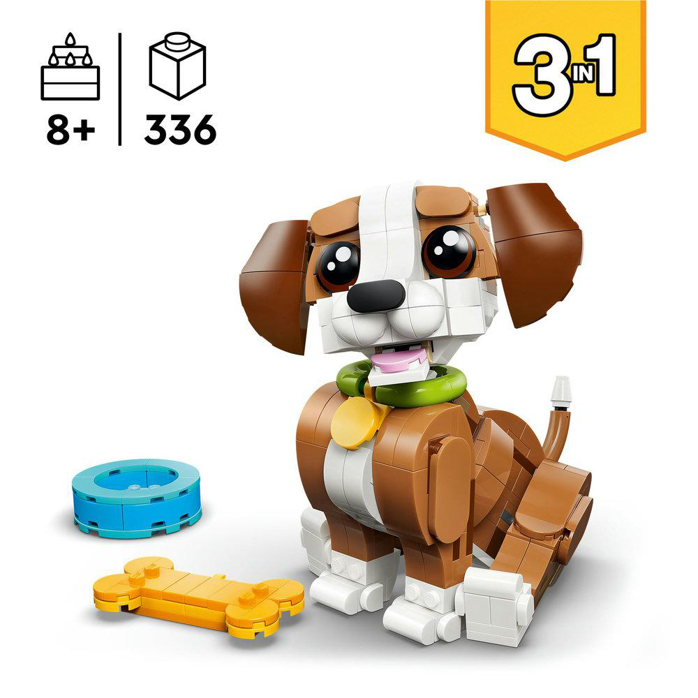 Ein Lego-Hund, Knochen und blaues Ring-Spielzeug. Set enthält Alter 8+ und 336 Teile. Der Hund ist braun, weiß und hat ein gelbes Halsband.