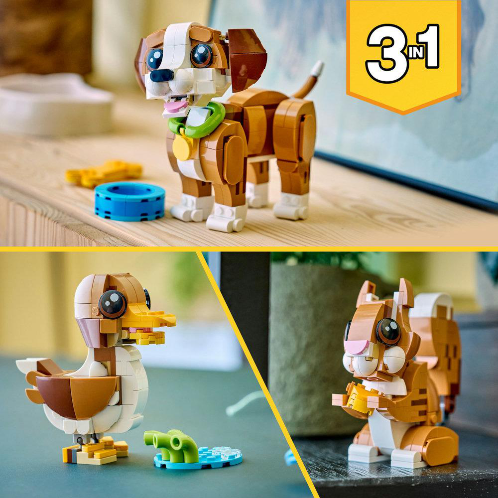 Ein Lego-Hund, eine Ente und ein Eichhörnchen werden gezeigt. Der Hund ist braun und weiß mit grünem Halsband. Die Ente ist braun und weiß. Das Eichhörnchen ist braun.