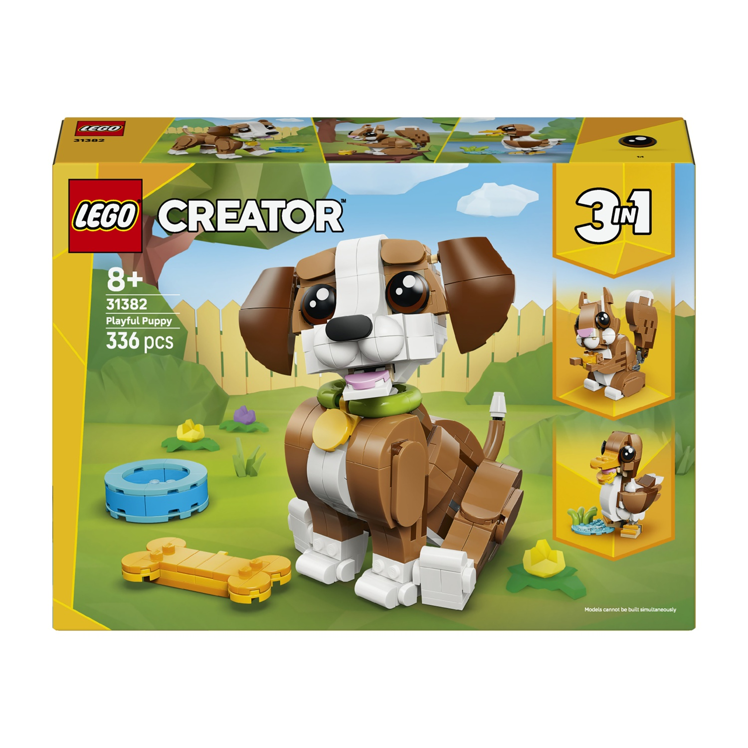 Scatola Lego Creator. Un cucciolo marrone e bianco è l'immagine principale, con uno scoiattolo e un'anatra sul lato. Lo sfondo è un prato verde.