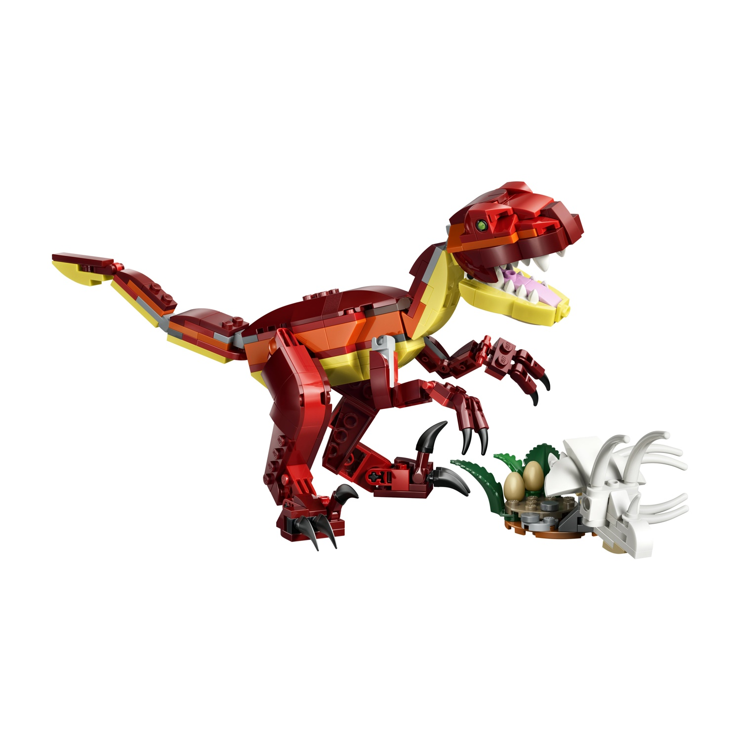 Un dinosauro Lego, rosso e giallo, si lancia verso un nido con uova e una struttura bianca simile a un teschio su sfondo bianco.
