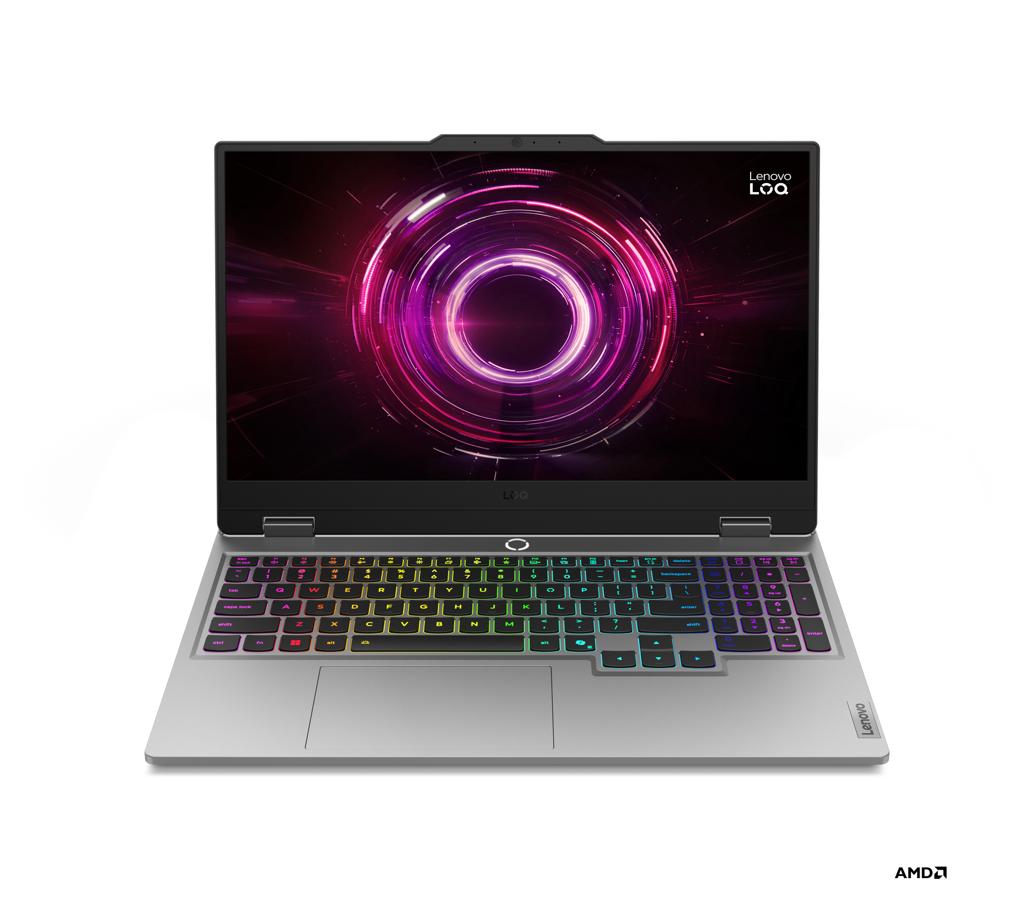 Bir Lenovo Loq dizüstü bilgisayar açık. Ekran, parlayan bir daire tasarımı gösteriyor. Klavye gökkuşağı renkleriyle aydınlatılıyor. Arka plan siyah.