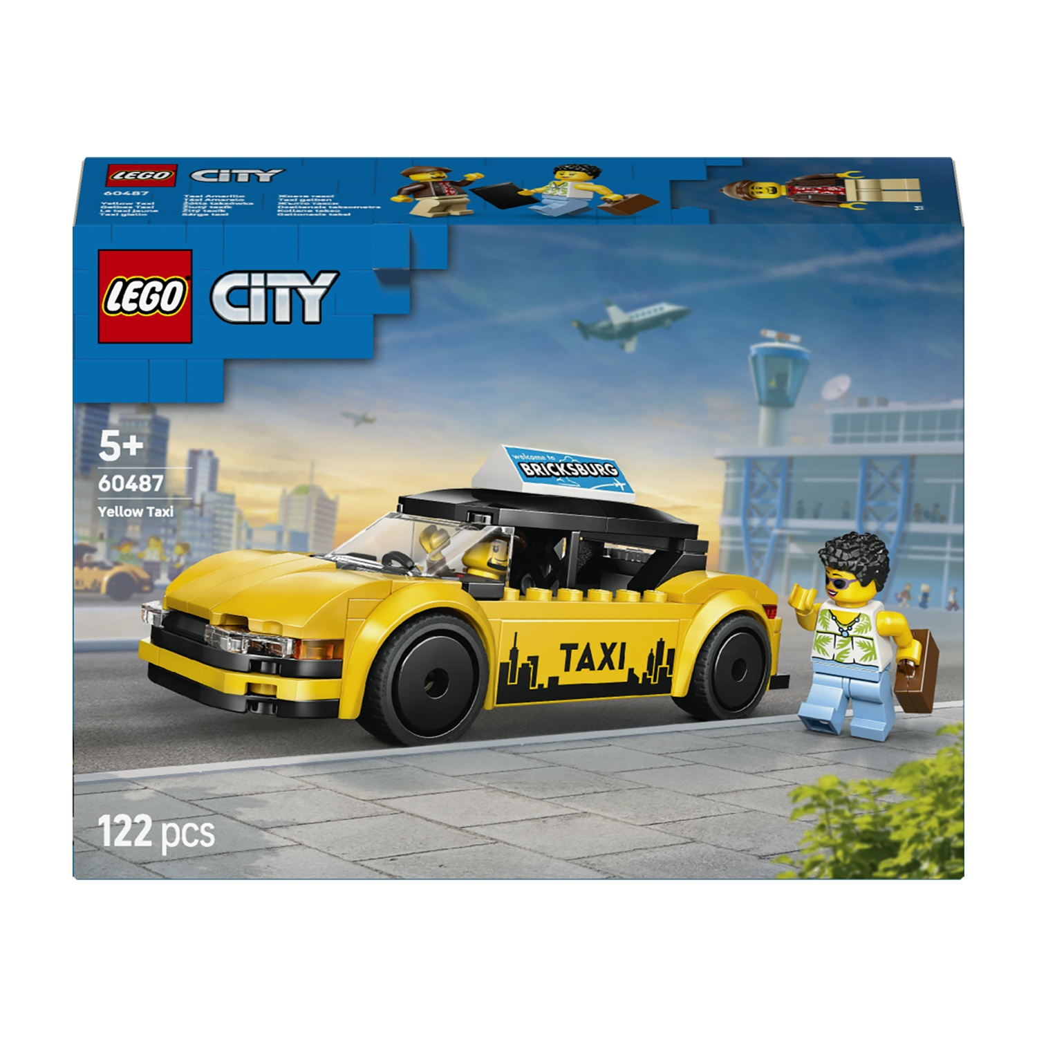 Una scatola del set Lego City mostra un taxi giallo, un personaggio Lego con una valigia e uno sfondo aeroportuale.