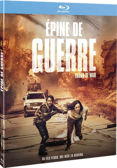 Blu-ray disc cover met de titel ÉPINE DE GUERRE. Een man en vrouw rennen weg van een explosie, een auto op de achtergrond.