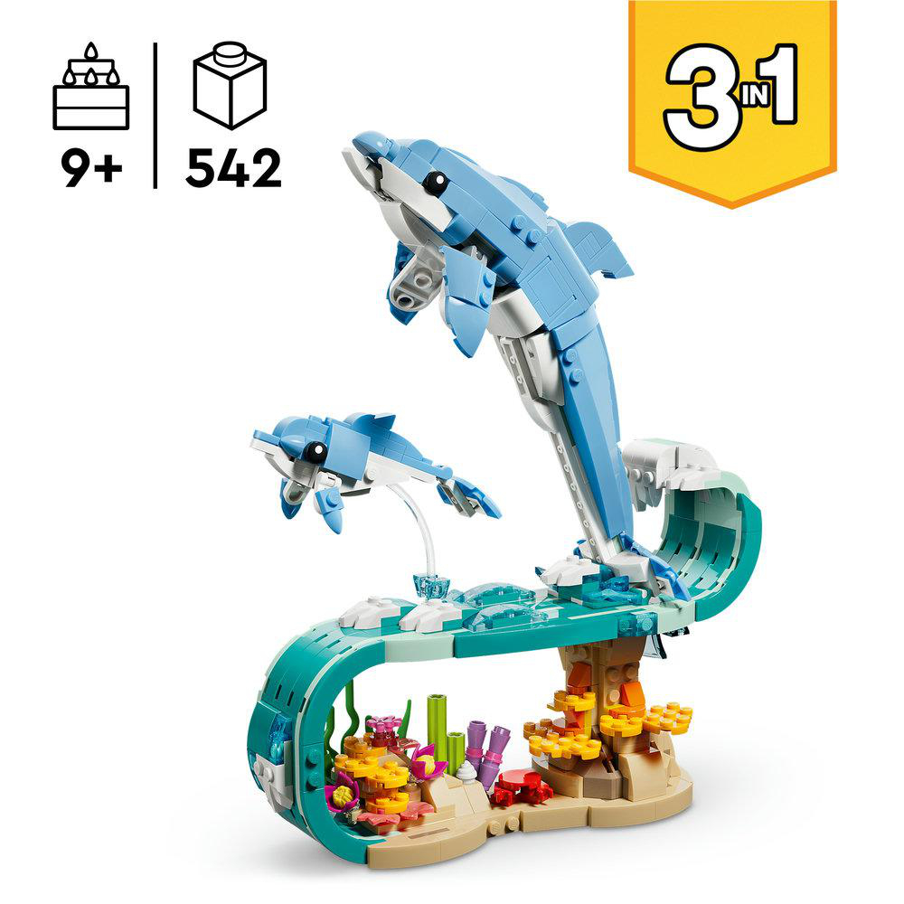 Ein Lego-Set mit blauen Delfinen, die aus dem Wasser springen. Das Set ist mit '9+' und '542' Teilen gekennzeichnet. Ein gelbes '3 in 1' ist ebenfalls abgebildet.