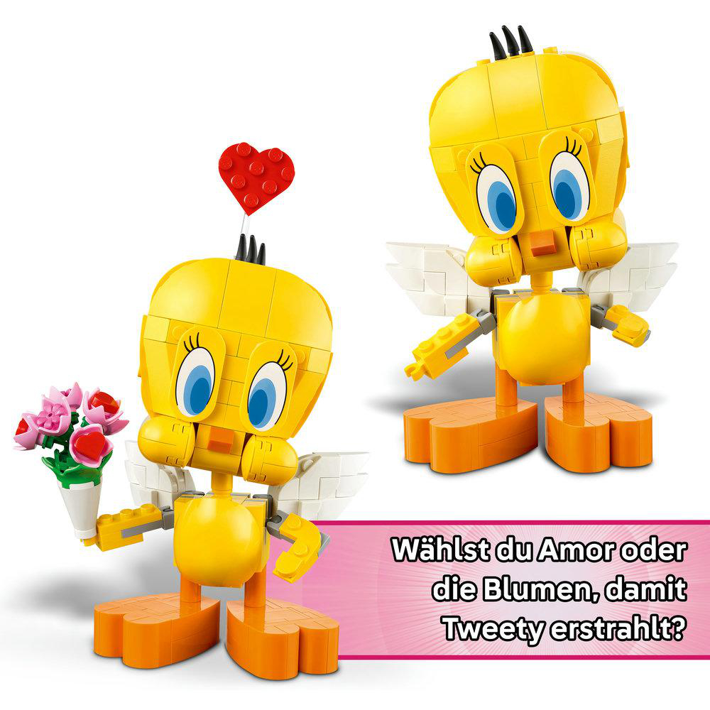 Zwei Lego Tweety Bird Figuren. Eine hält Blumen, die andere ein Herz. Deutscher Text fragt, was Tweety haben soll.