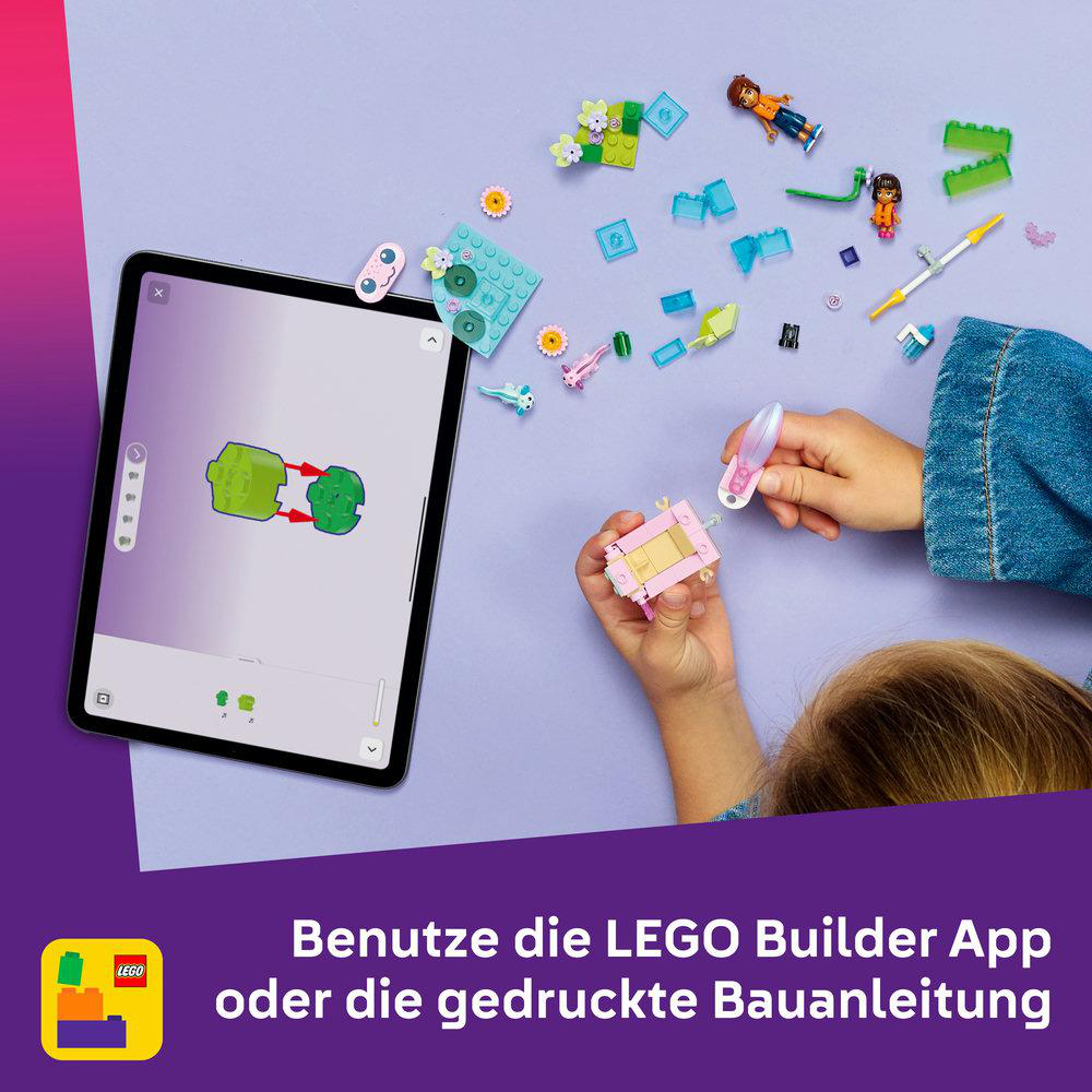Ein Kind baut mit LEGO. Ein Tablet zeigt Bauanleitungen. Verschiedene LEGO-Teile und Mini-Figuren sind verstreut.