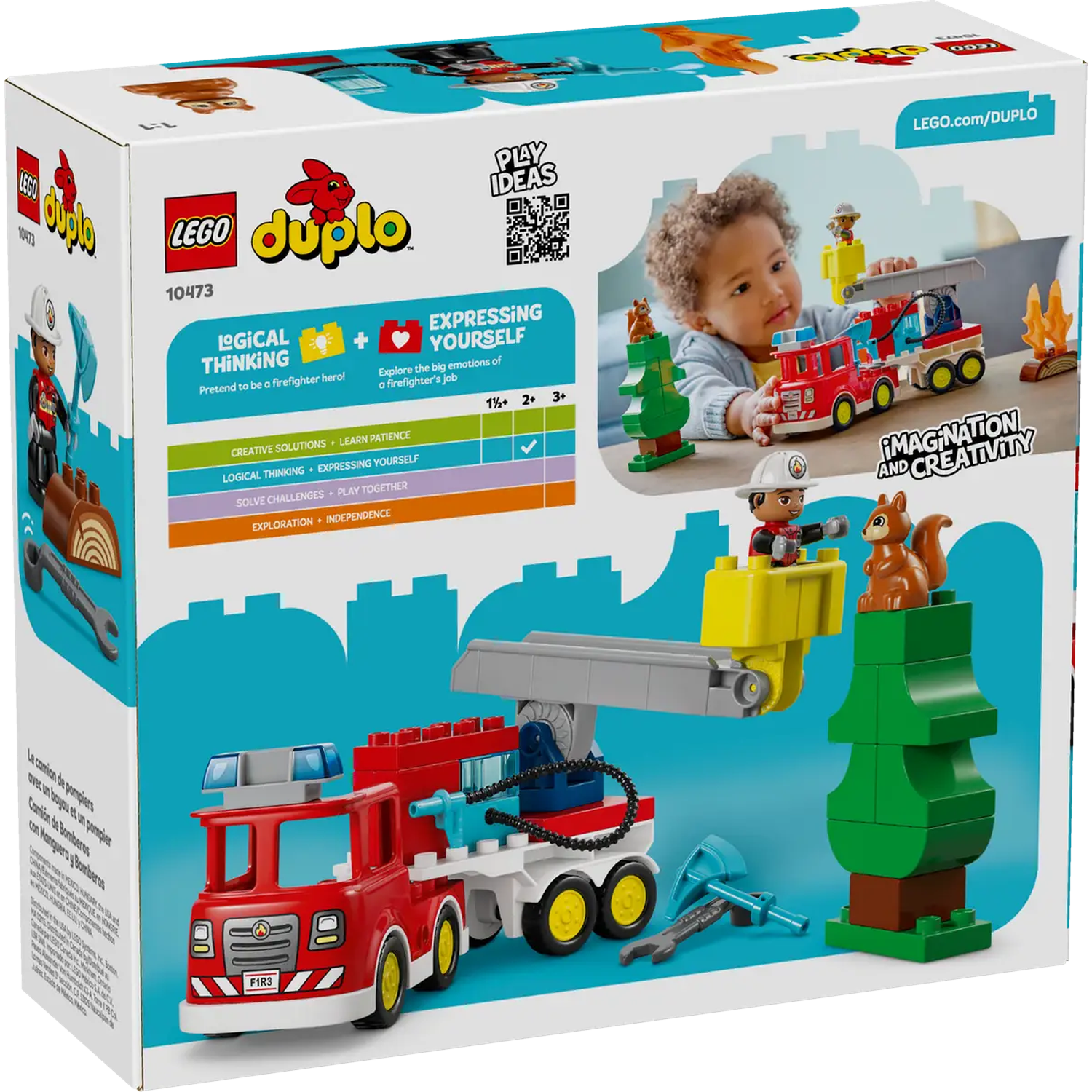 Lego Duplo fire truck box. A child plays with the Lego set. The box shows the set's components: truck, figures, and accessories.