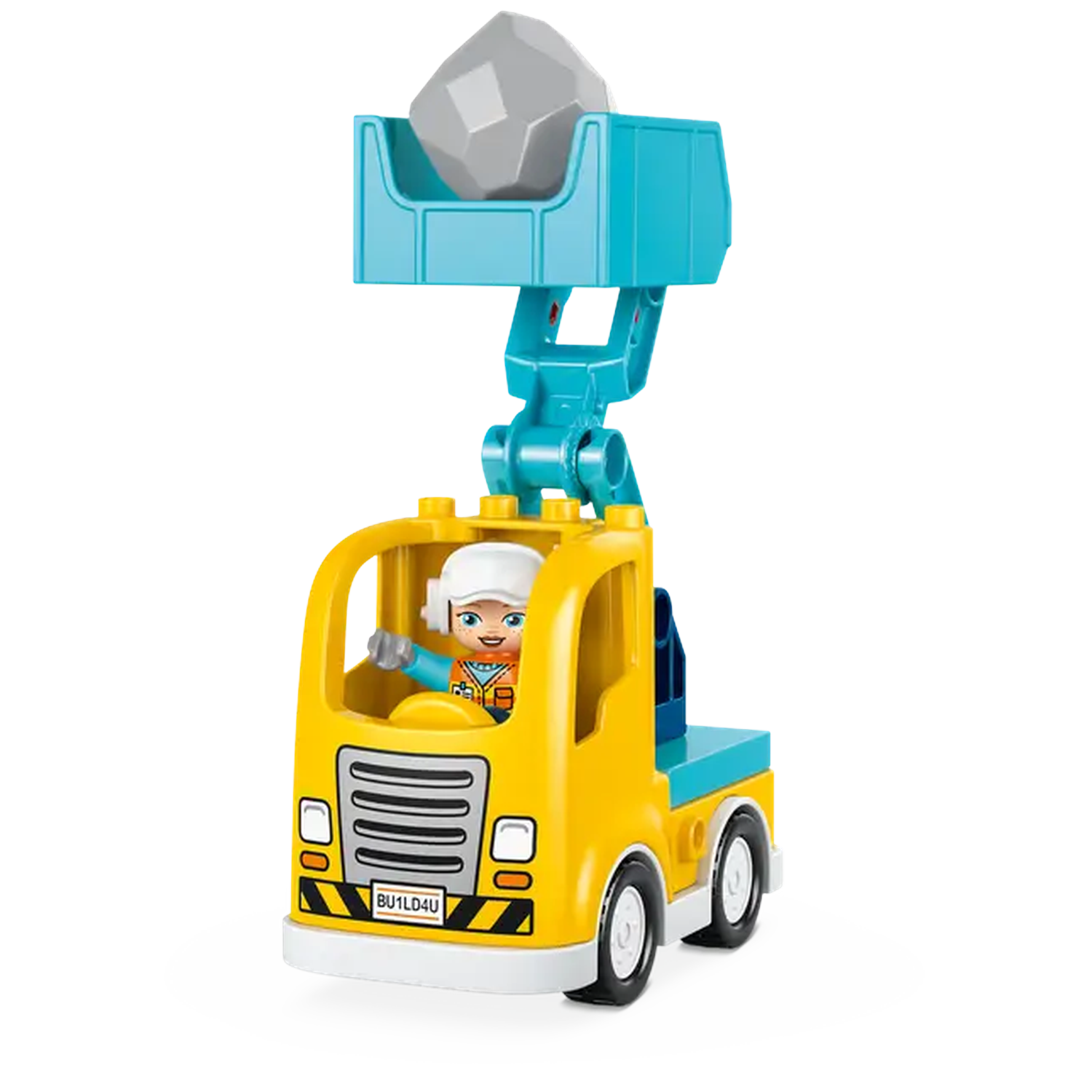 A yellow toy truck with a construction worker in the cab, lifting a gray rock with a blue crane.
