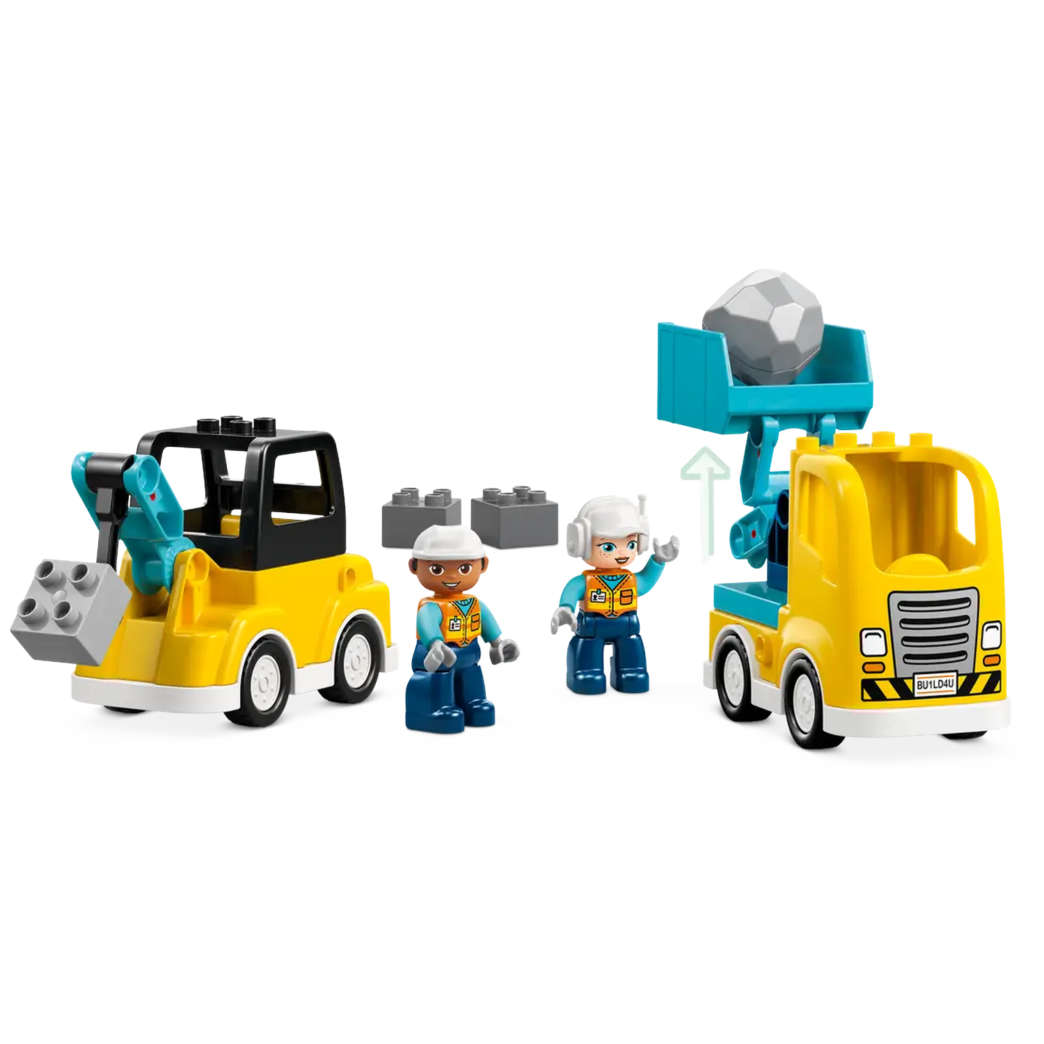 A toy construction set with yellow trucks, workers, gray blocks, and a large rock in a truck's bed, on a white background.