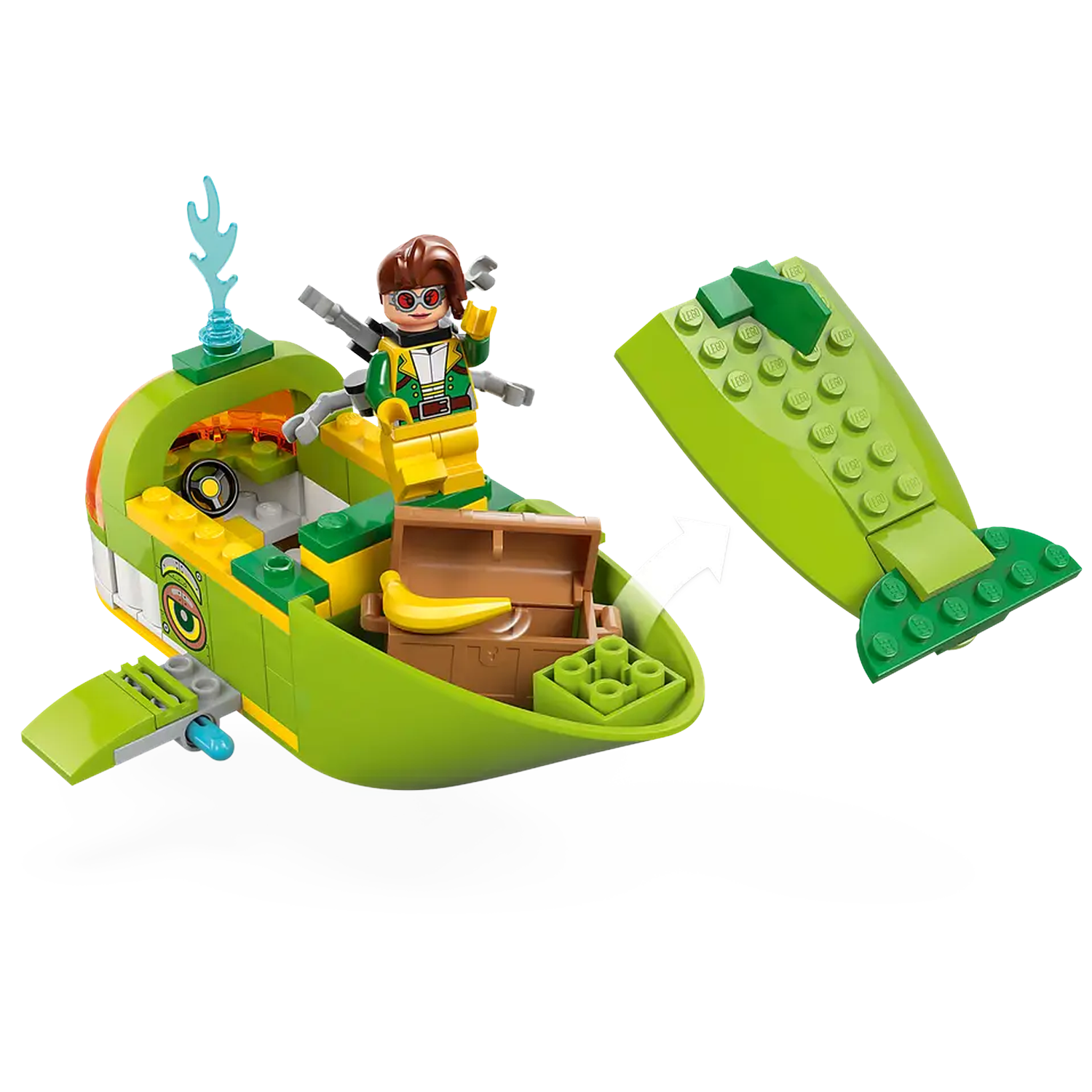 A green Lego whale-shaped boat with a minifigure, chest, and banana. A section of the whale is detached.