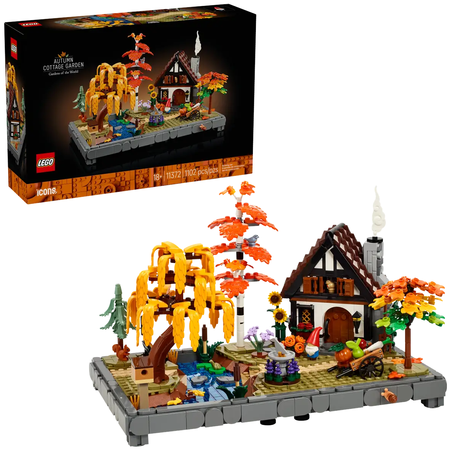 Lego set: Autumn Cottage Garden. A detailed model with a cottage, trees, a small stream, and a cart with vegetables. The box is also present.