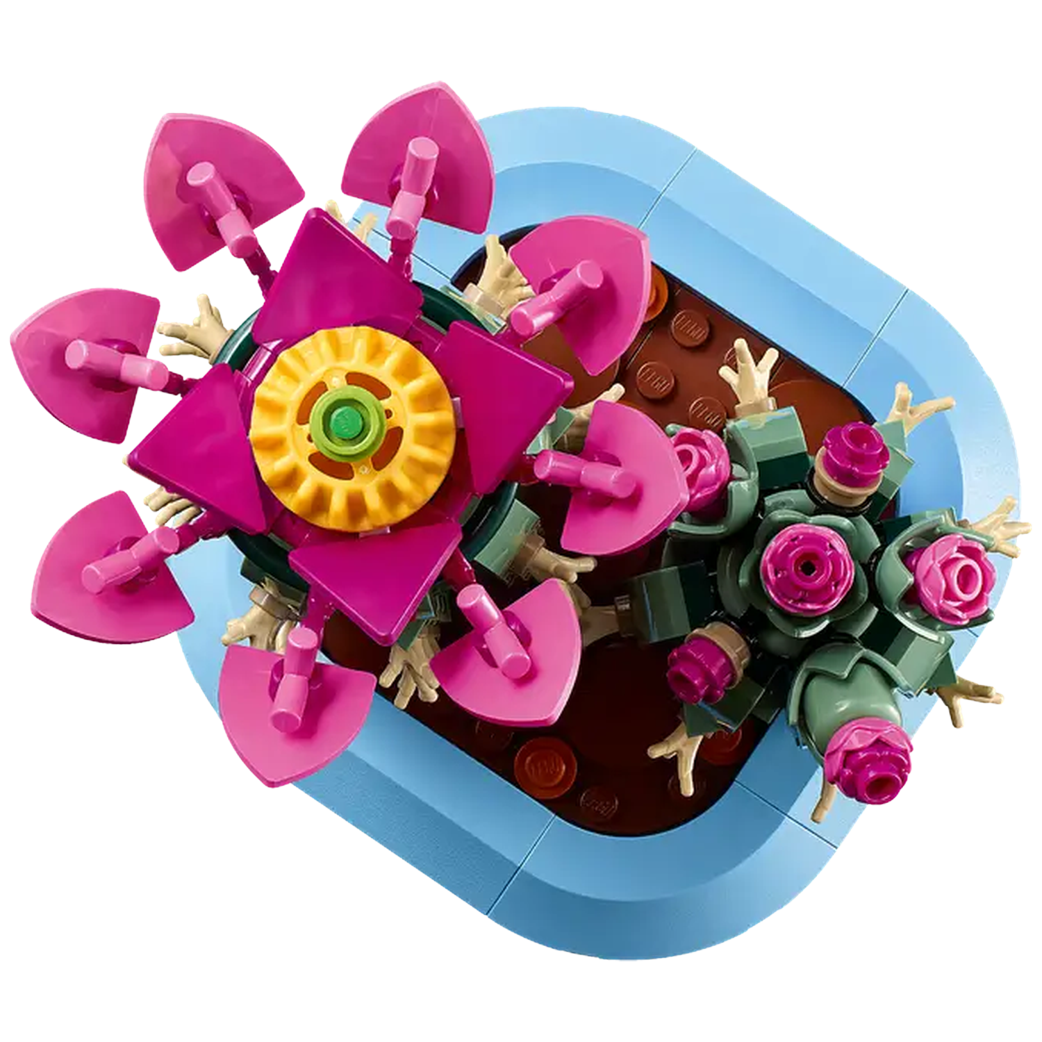 A Lego flower arrangement. It features large pink flowers with yellow centers and smaller green buds, set in a blue container.