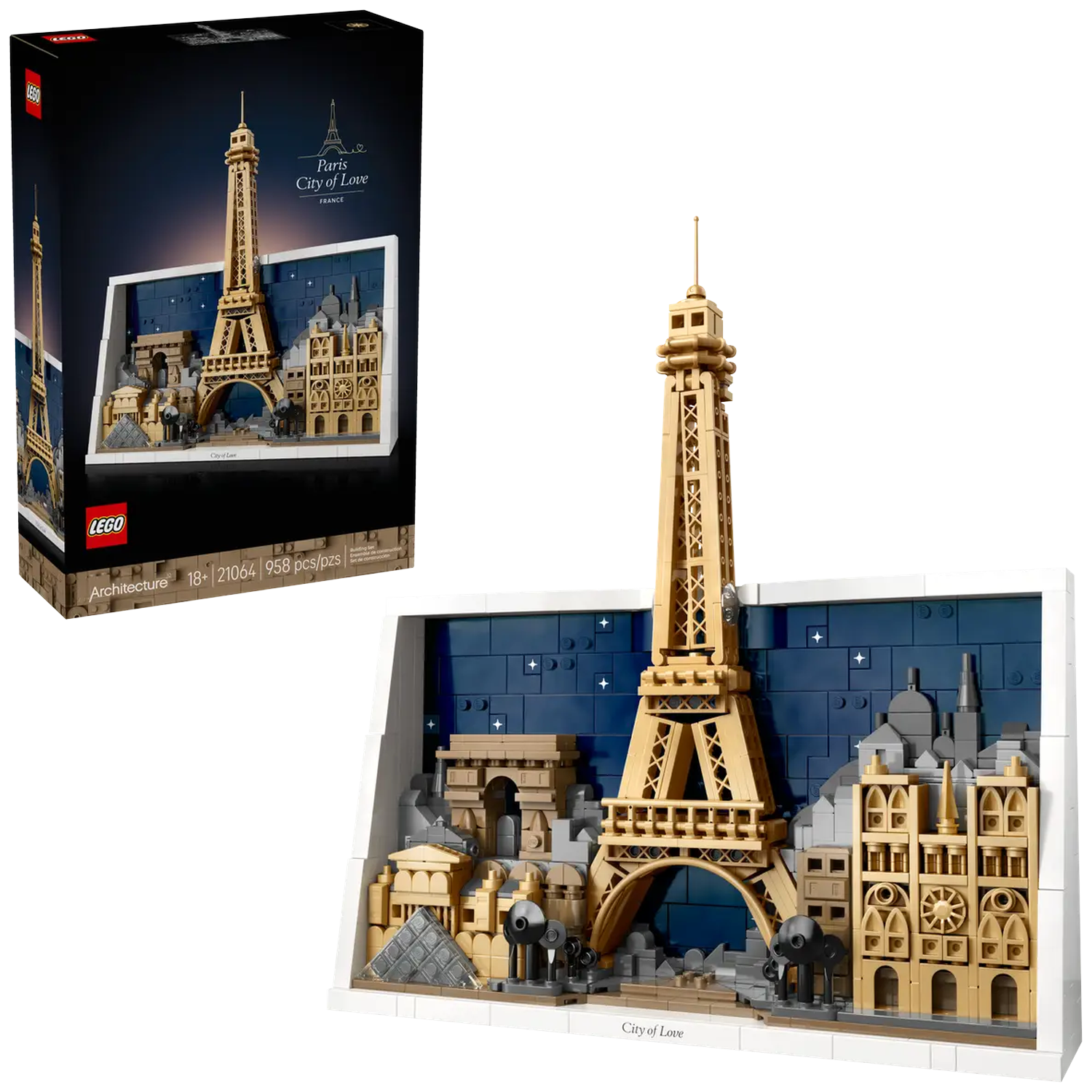 A Lego set depicting Paris. The Eiffel Tower, Arc de Triomphe, and other buildings are visible against a blue night sky.