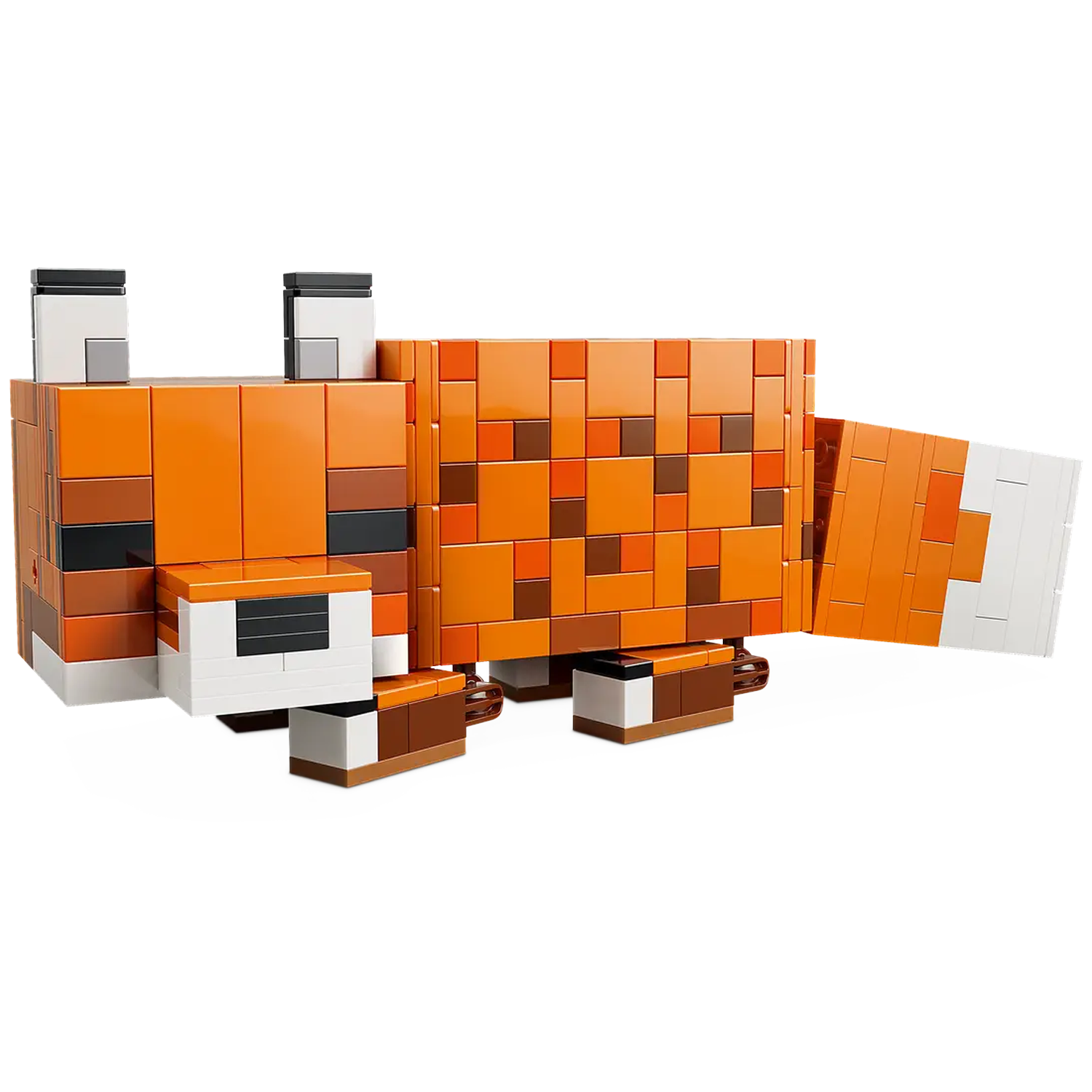 A Minecraft fox made of orange, brown, and white blocks. It has large ears, a long body, and a white-tipped tail.