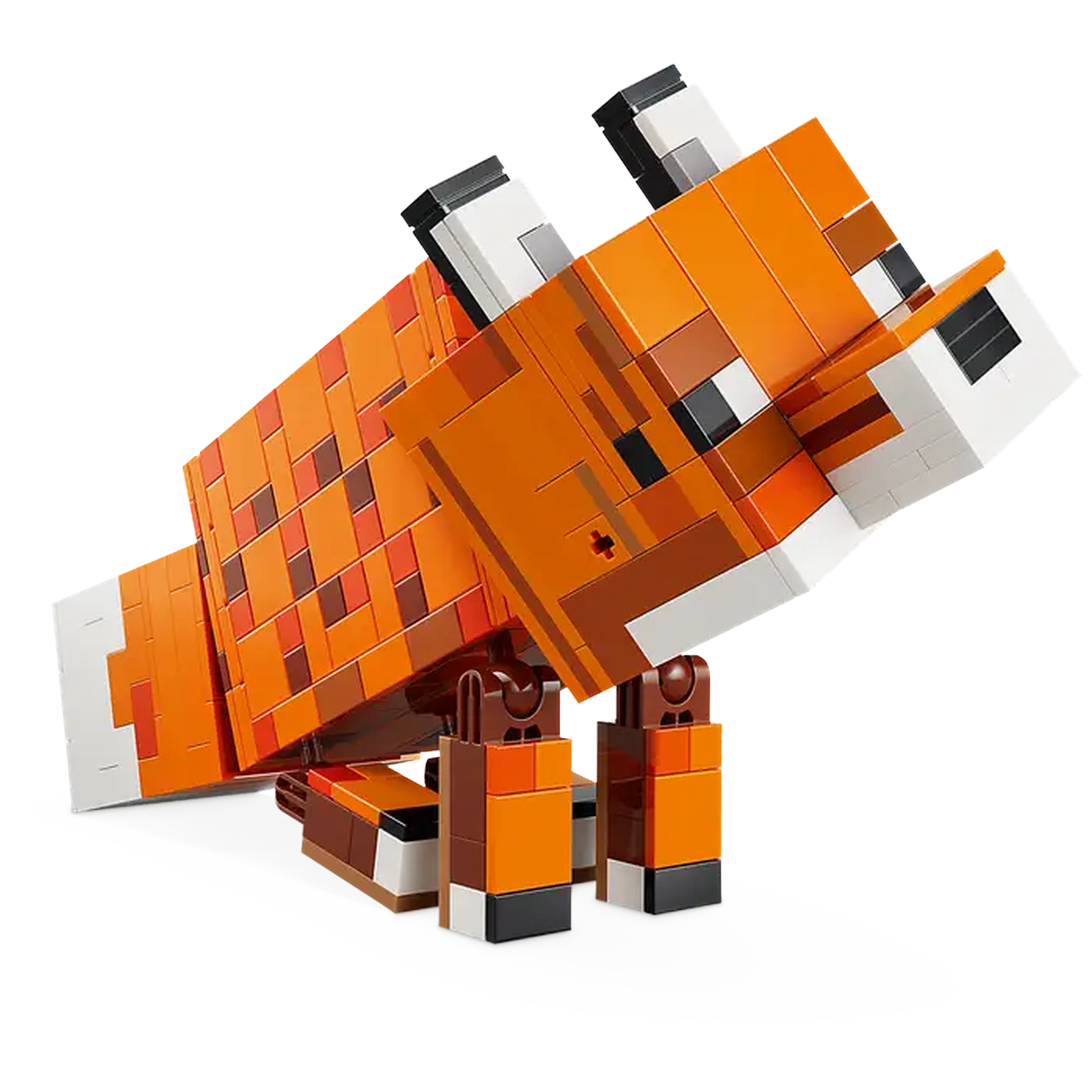 A Minecraft fox made of Lego bricks. It is orange and white, with black accents. The fox is in a crouching position.
