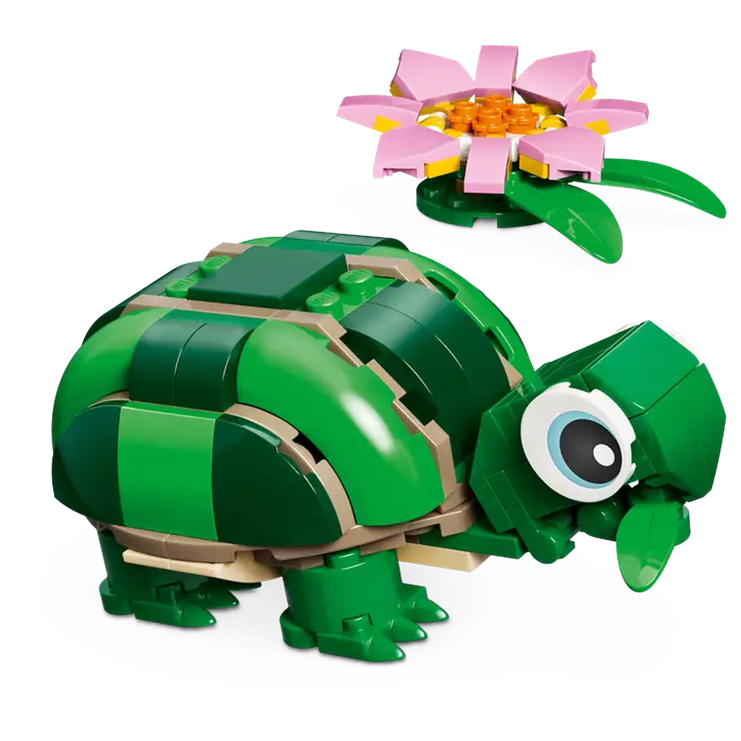 A Lego turtle and flower are on a white background. The turtle is green, with tan accents, and the flower is pink and yellow.