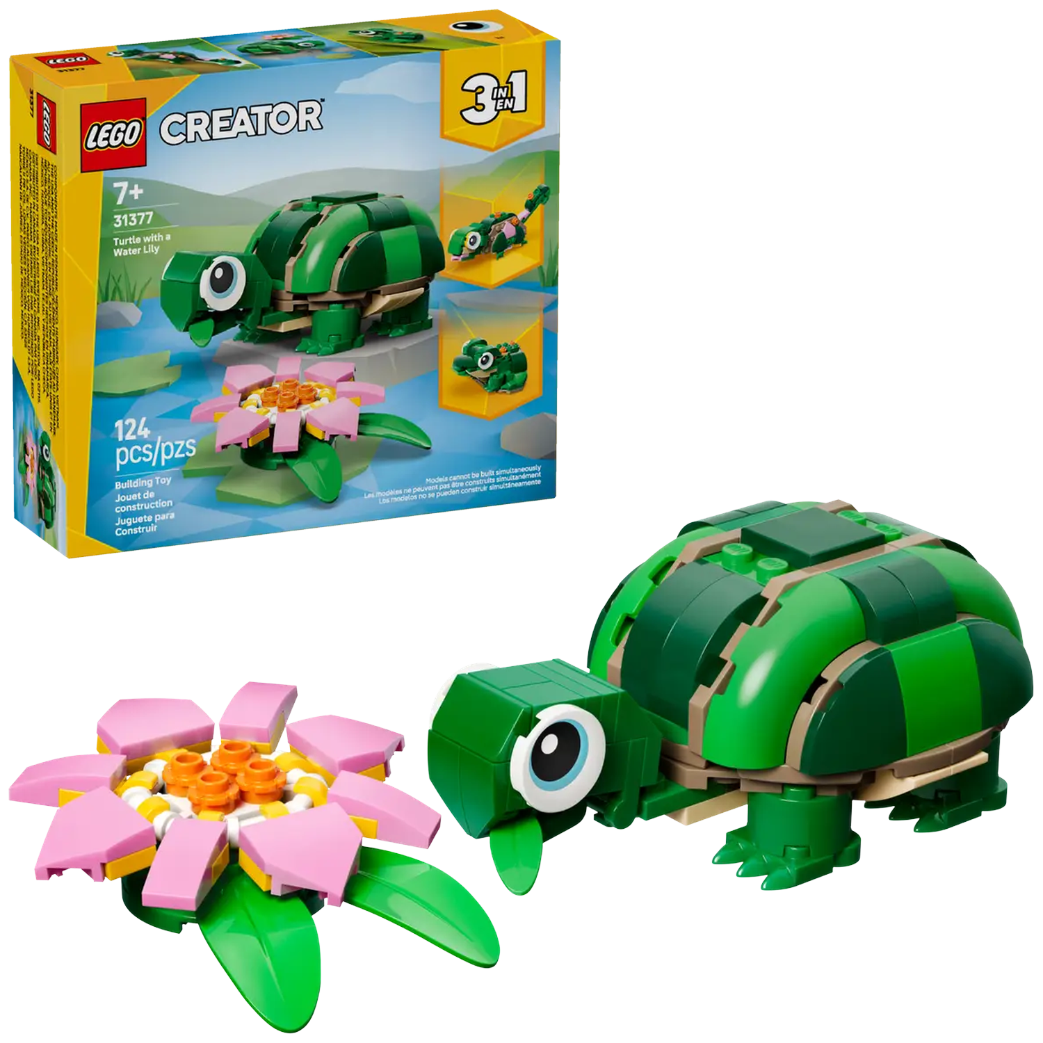A Lego set featuring a green turtle, a pink water lily, and the box. The box shows the turtle and lily. The set is 3-in-1.