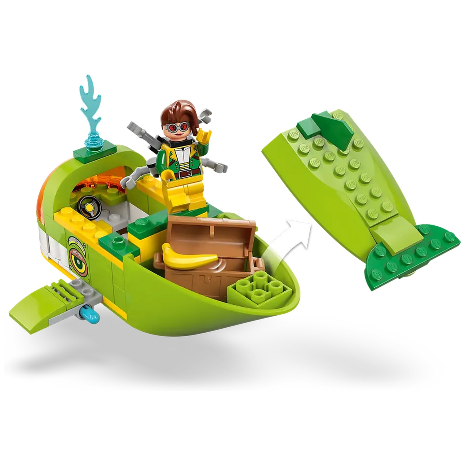 Un ensemble Lego montre un véhicule vert et jaune avec une figurine. Une banane et un coffre sont à l'intérieur. Une partie du véhicule est détachée.