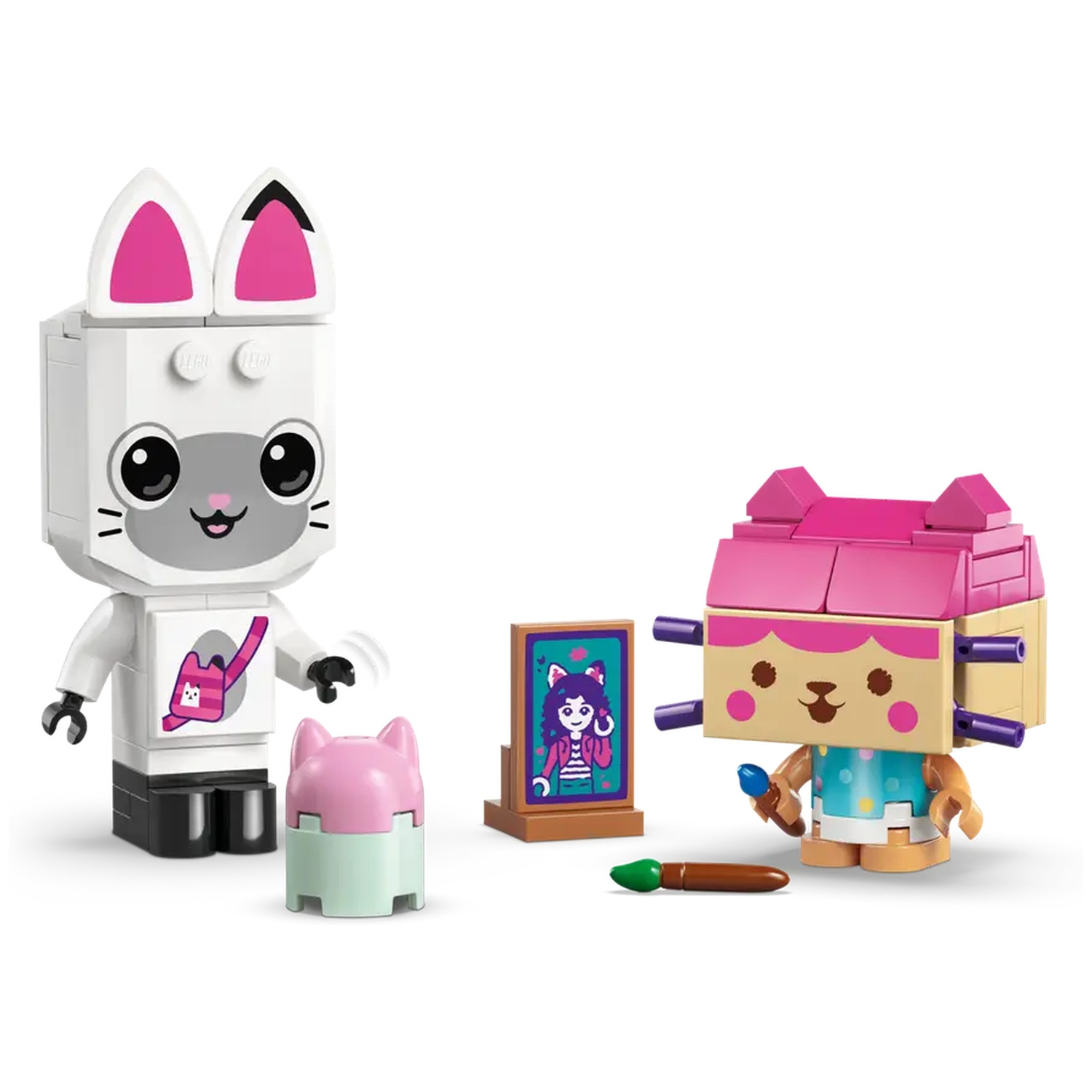 Deux figurines Lego : un chat blanc avec des oreilles roses et un chat brun clair avec un pinceau et une peinture. Des objets en forme de chat sont présents.