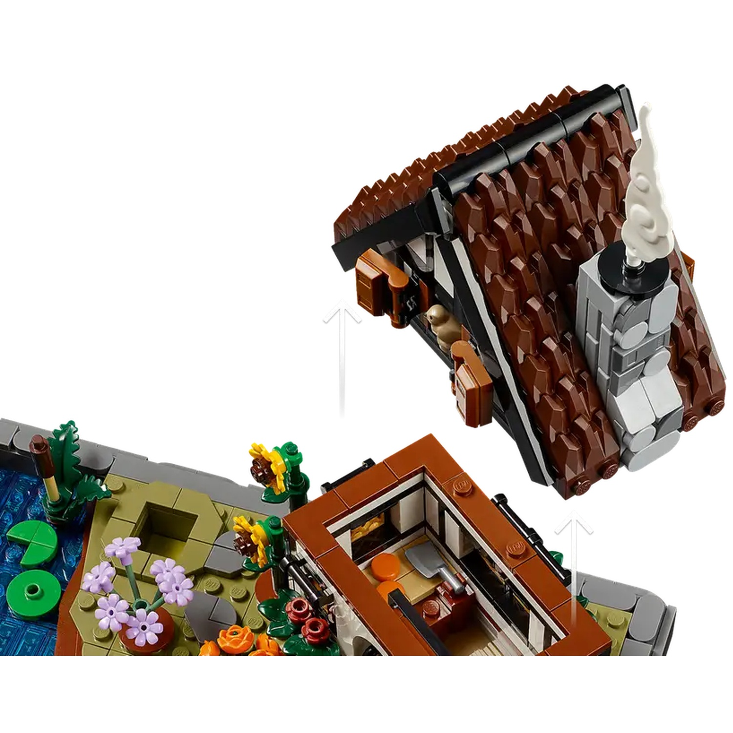 Ensemble Lego d'une maison avec un toit marron et un étang avec des fleurs. Le toit est soulevé. De la fumée sort de la cheminée.