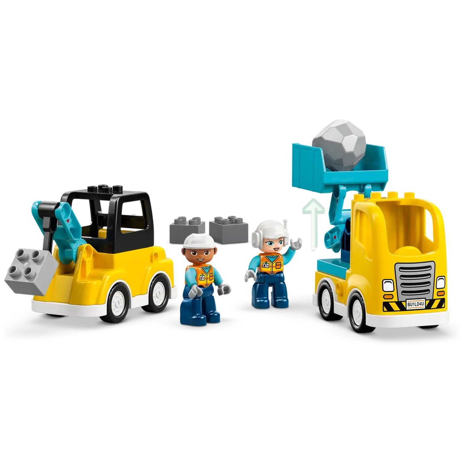 Un jeu de construction avec des camions jaunes, deux figurines et des blocs gris. Un camion soulève un rocher. Les figurines portent des gilets.