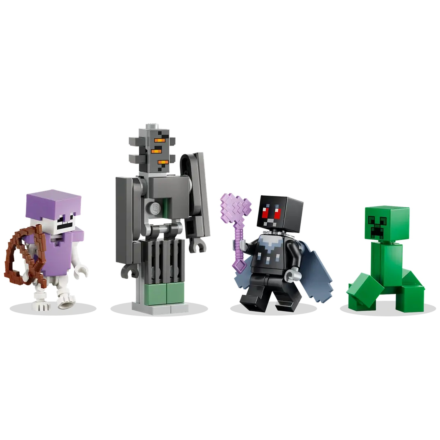 Quatre figurines Minecraft : squelette, golem de fer, wither et creeper. Elles sont en briques Lego sur fond blanc.