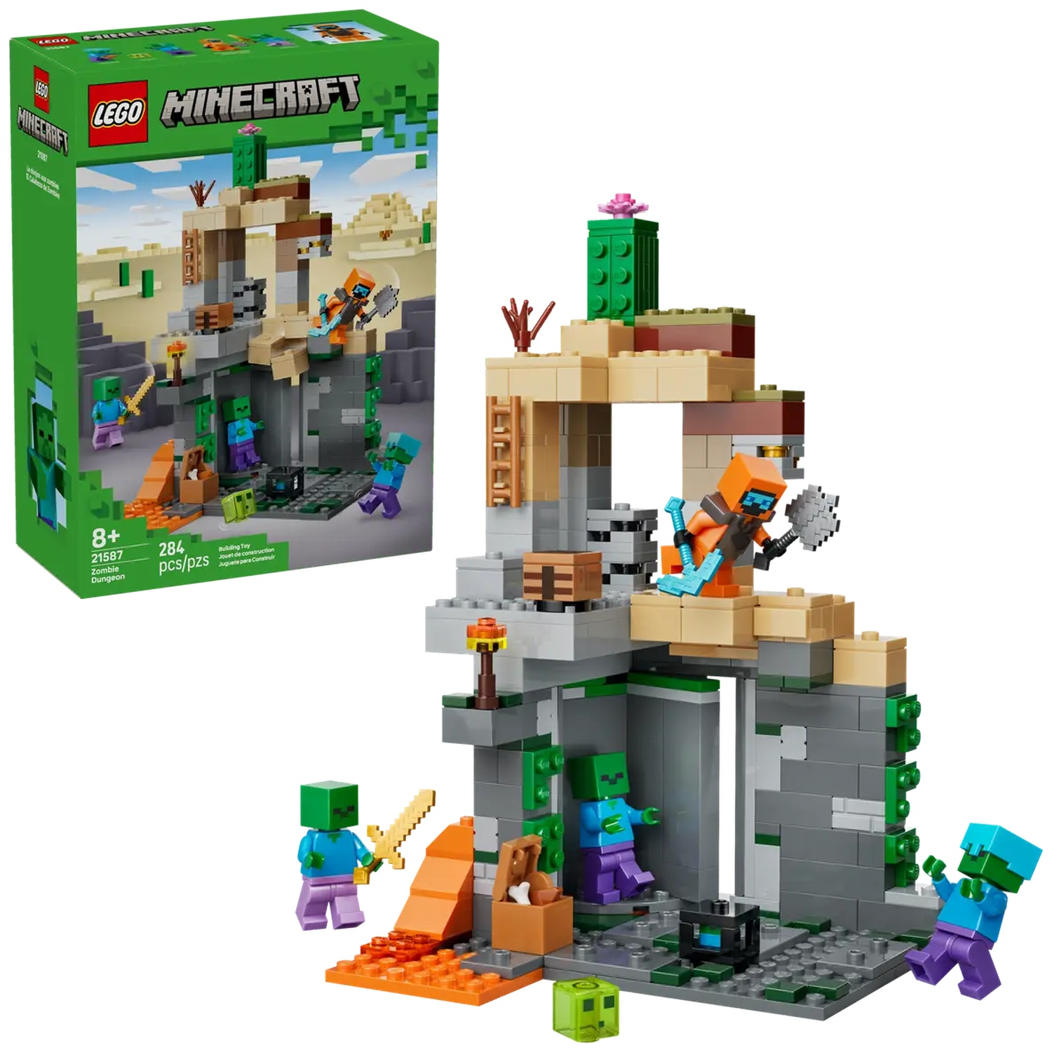Ensemble LEGO Minecraft. Comprend des figurines de zombies, un personnage orange et une structure de type donjon avec un cactus et un coffre.