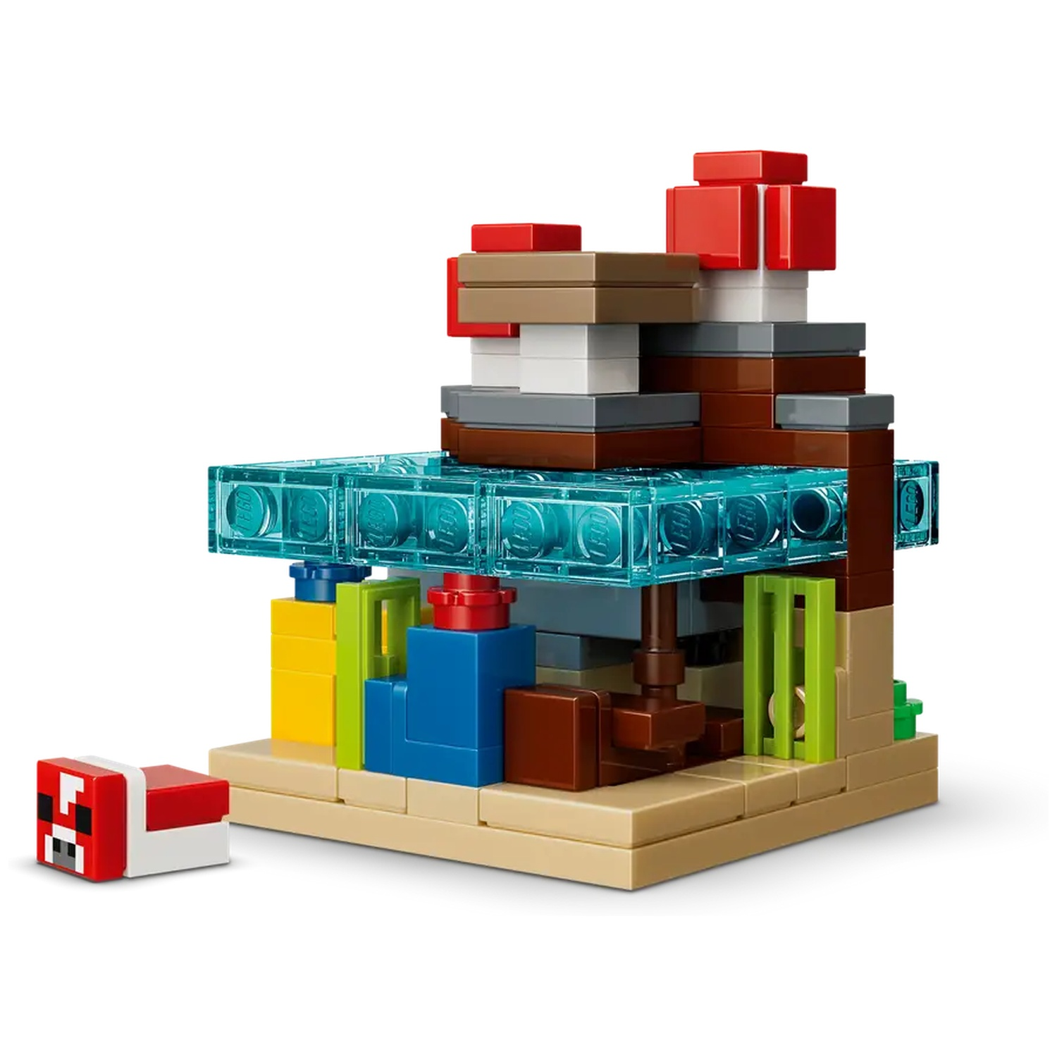 Un ensemble Lego Minecraft, mettant en scène une créature rouge et blanche, et un bâtiment avec des blocs de couleurs et des blocs bleus transparents.