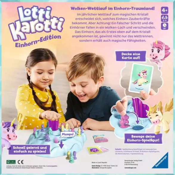 Zwei Kinder spielen ein Brettspiel mit Einhornfiguren. Die Spielbox ist sichtbar.