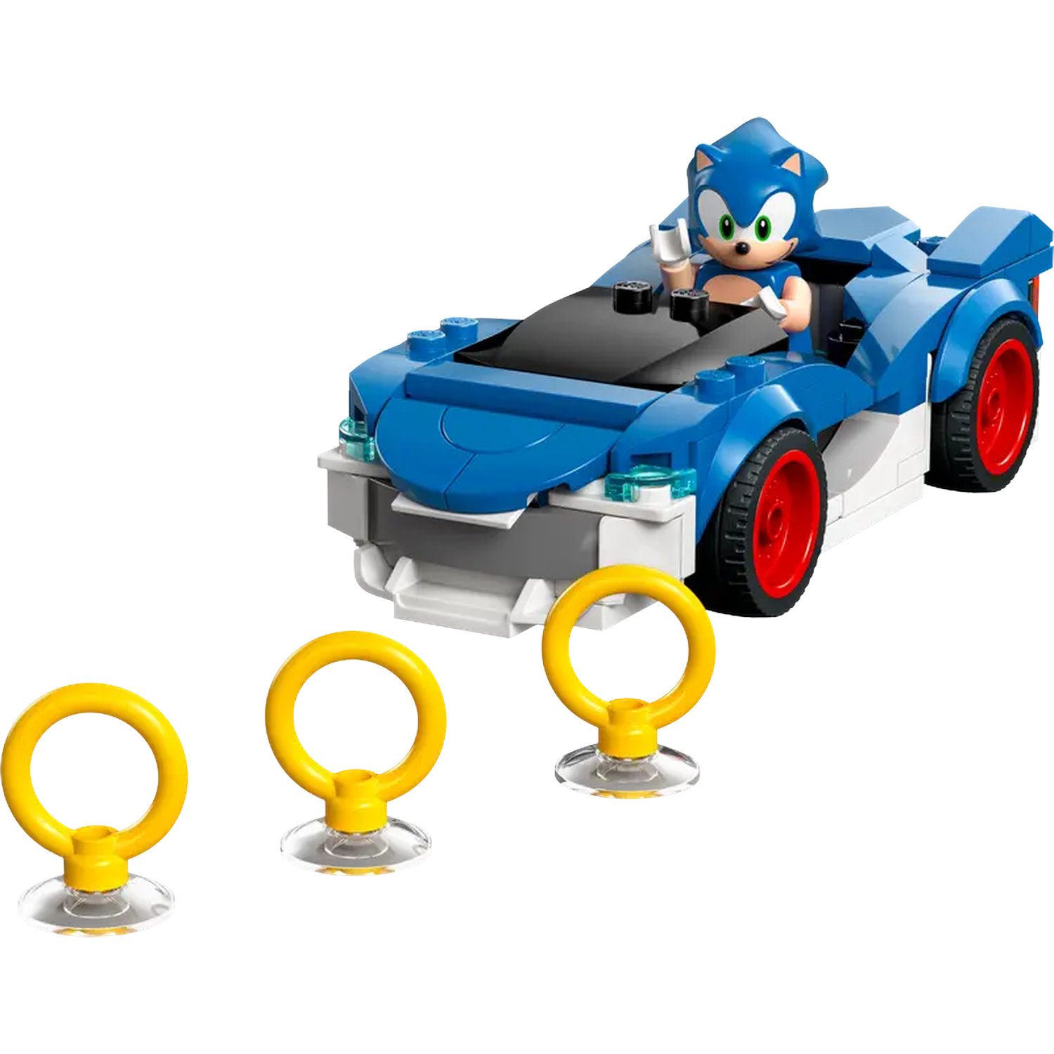 Sonic Lego set. Sonic in een blauwe raceauto met rode wielen. Drie gele ringen voor de auto.