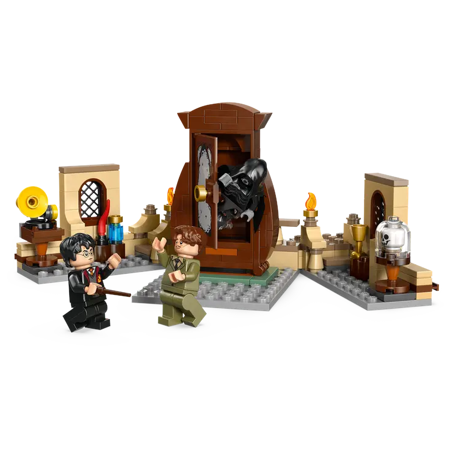 Lego set depicting Harry Potter and others in a scene. A figure in black emerges from a brown cabinet.