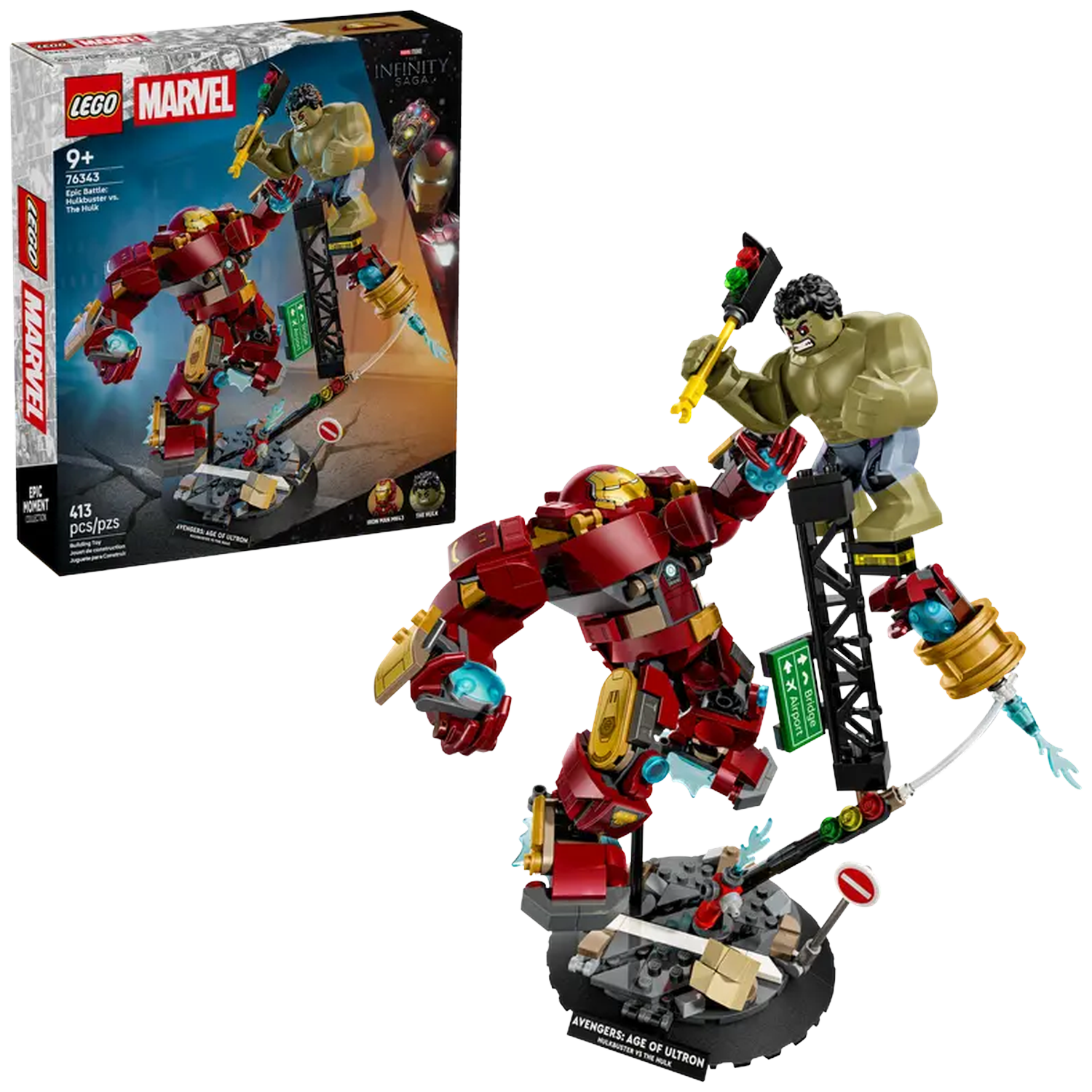 Lego set: Hulkbuster vs. The Hulk. Iron Man in red armor faces Hulk. Black structure with street signs. Box art in the background.