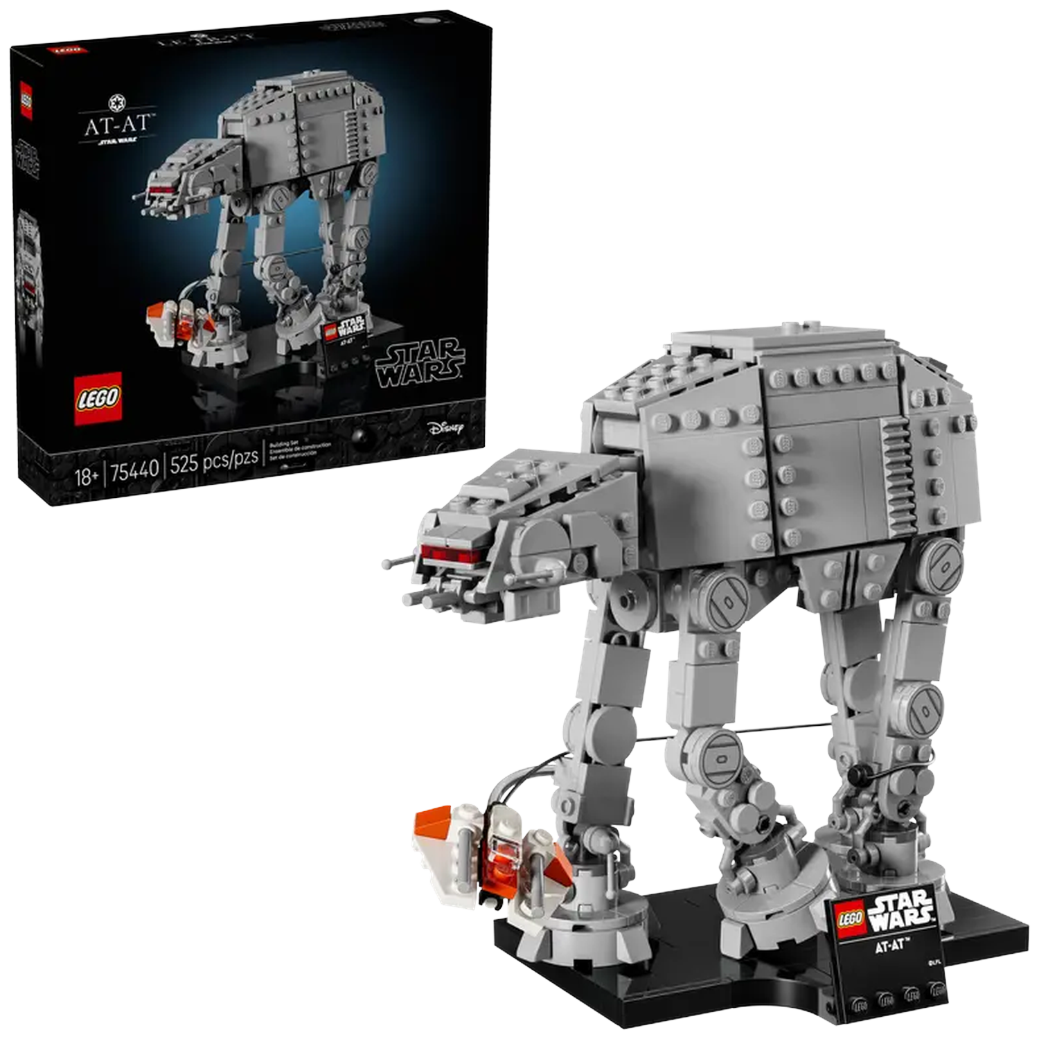 Een Lego AT-AT-model staat op een zwarte basis. Een doos met hetzelfde model staat op de achtergrond.