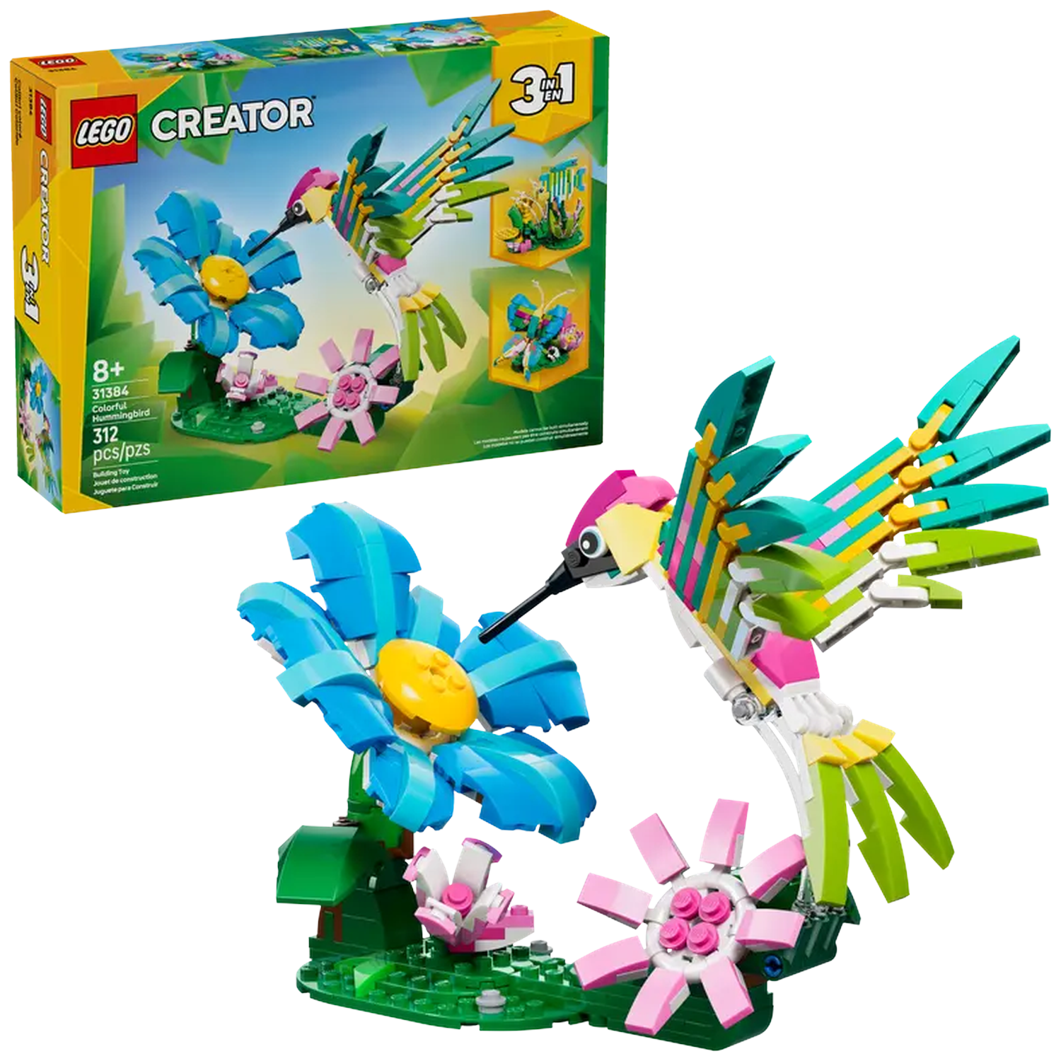 A Lego Creator set features a colorful hummingbird and flowers. The box is visible. The hummingbird is near blue and pink flowers.