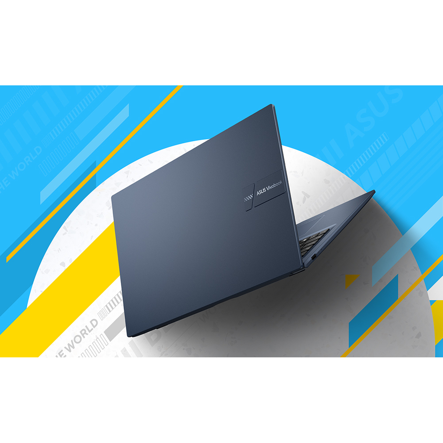 A dark blue ASUS Vivobook laptop is open on a white circle against a blue and yellow abstract background.