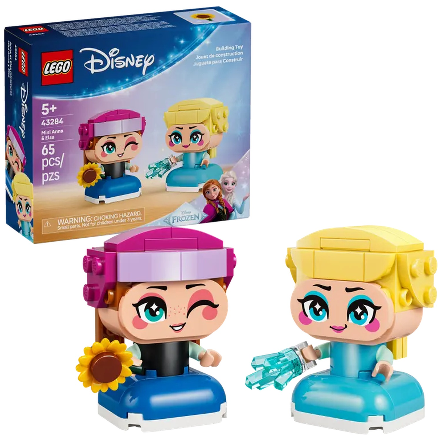Lego Disney set met Anna en Elsa minifiguren. Anna houdt een zonnebloem vast, en Elsa een ijskristal. De doos staat achter.