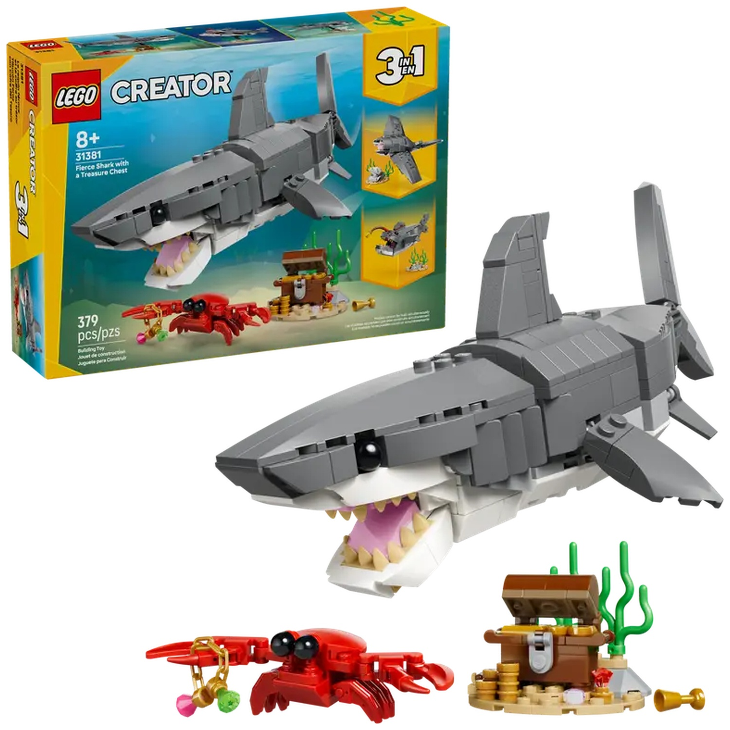 Lego Creator set met een haai, krab, schatkist en zeewier. De haai heeft een open bek. Een doos staat op de achtergrond.