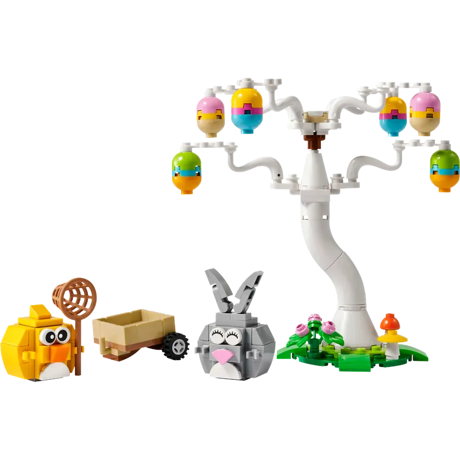 Une scène de Pâques Lego avec un arbre, des œufs, un poussin, un lapin, une charrette et un champignon.