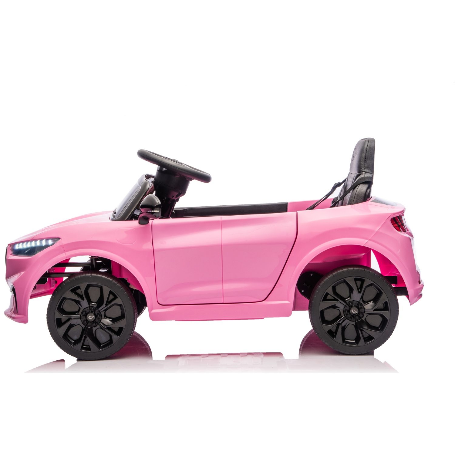 A pink toy car with black wheels and steering wheel. It has a single seat and is against a white background.