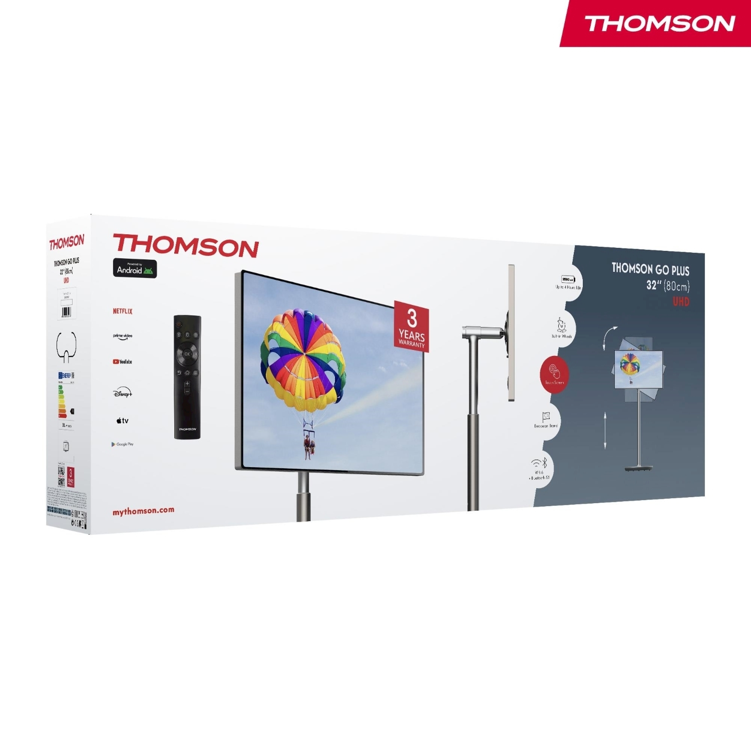 Caja de TV Thomson Go Plus 32" UHD. Muestra un televisor con una escena de parapente, mando y logo de Android.
