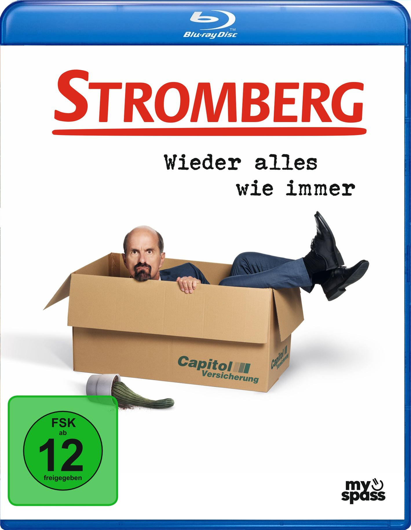 Blu-ray-Cover: Mann in einer Box. Titel 'Stromberg'. Text auf Deutsch. Grüne Rating-Box. Blauer Rand. Der Mann trägt einen Anzug.