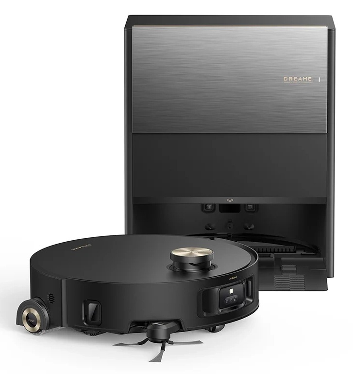 Czarny robot sprzątający Dreame ze złotymi akcentami stoi przed stacją ładującą.