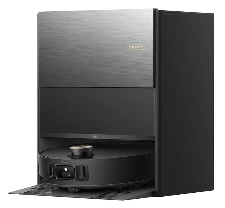 Czarny robot sprzątający jest zadokowany w wysokiej, nowoczesnej stacji ładującej z szczotkowanym metalowym blatem.