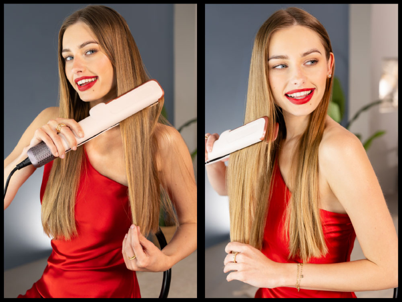 Kobieta z czerwonymi ustami i czerwoną sukienką prostuje blond włosy prostownicą.