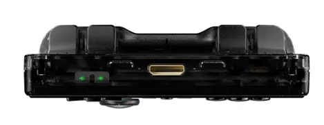 Czarne urządzenie o zaokrąglonych krawędziach i centralnym porcie. Dwa zielone światła po lewej stronie.