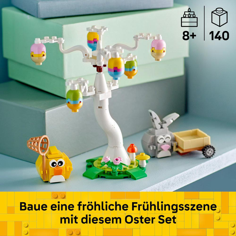 Ein Lego-Osterset mit weißem Baum, bunten eiförmigen Ornamenten, gelbem Küken, grauem Hasen und einem Wagen.