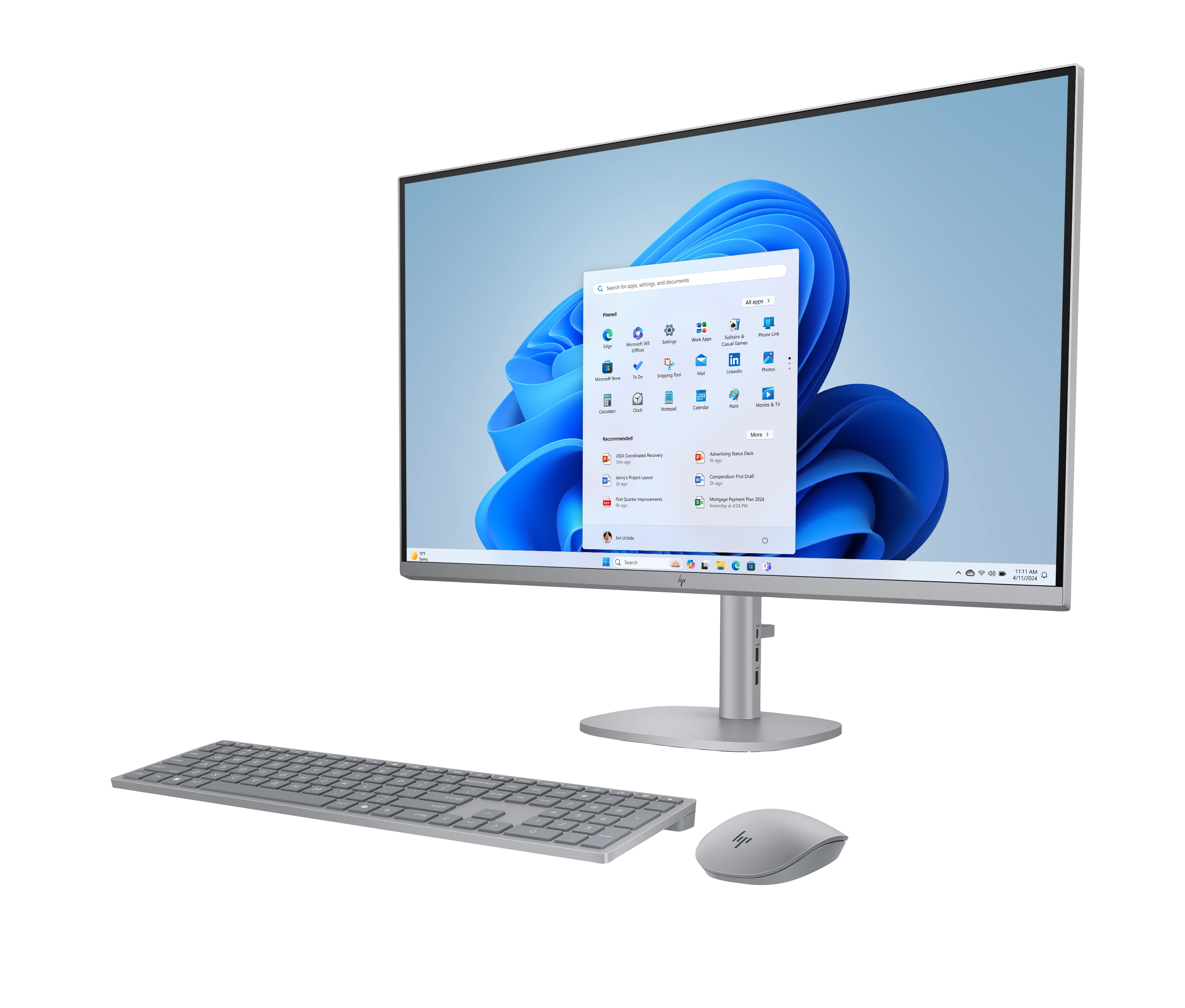 Ein Desktop-Computer-Setup. Es verfügt über einen Monitor, eine Tastatur und eine Maus. Der Bildschirm zeigt Windows 11.
