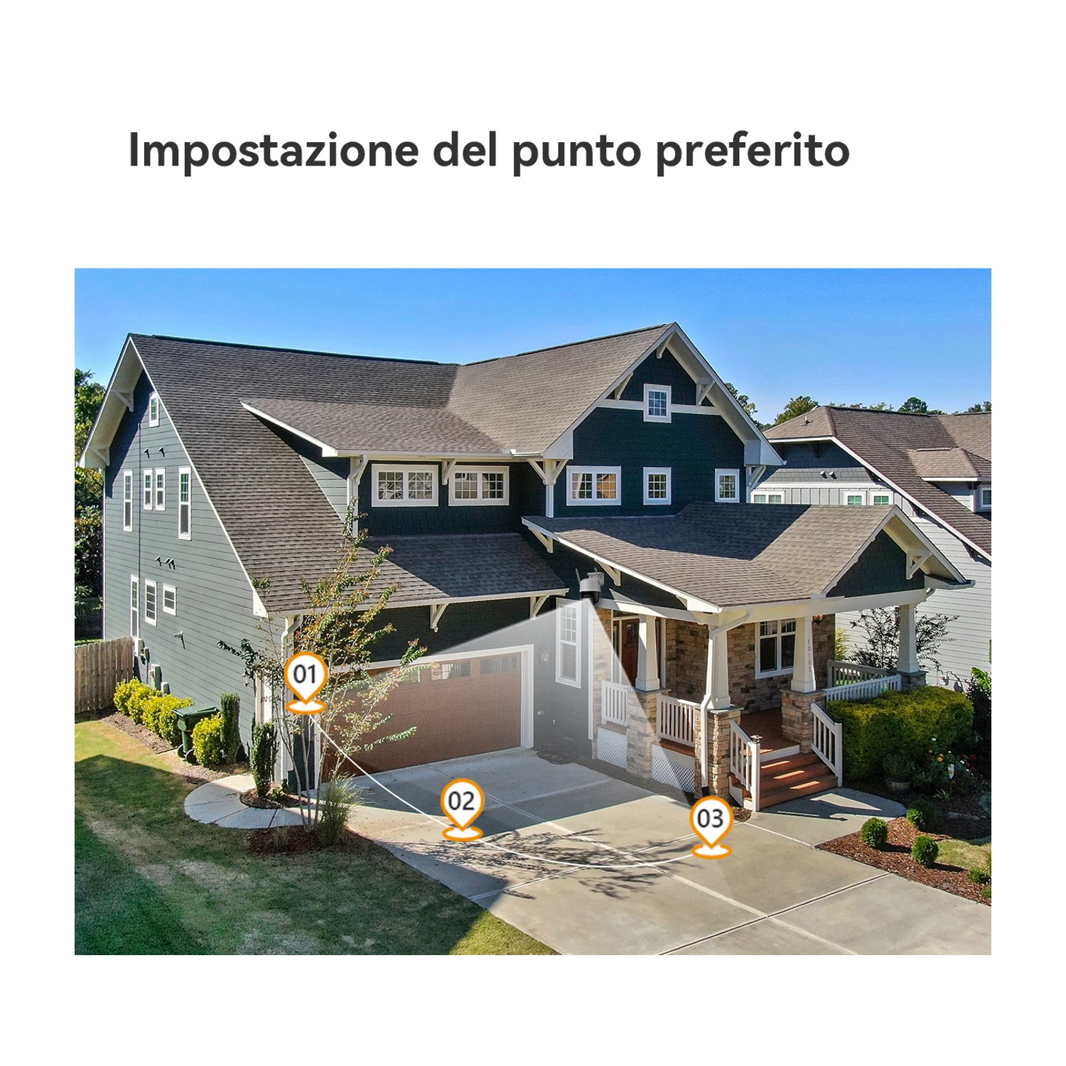 Una casa a due piani con esterno blu-grigio, porta del garage marrone e vialetto in cemento sotto un cielo blu.