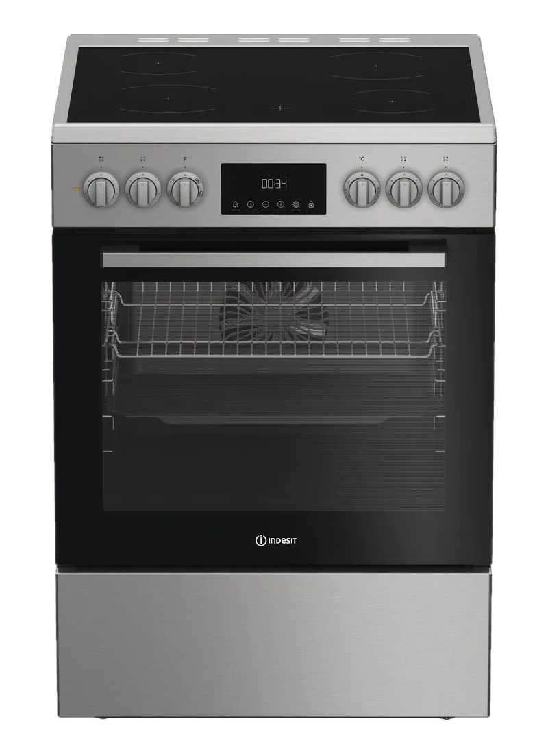 Four électrique Indesit en acier inoxydable avec porte vitrée noire, affichage numérique et quatre plaques de cuisson.