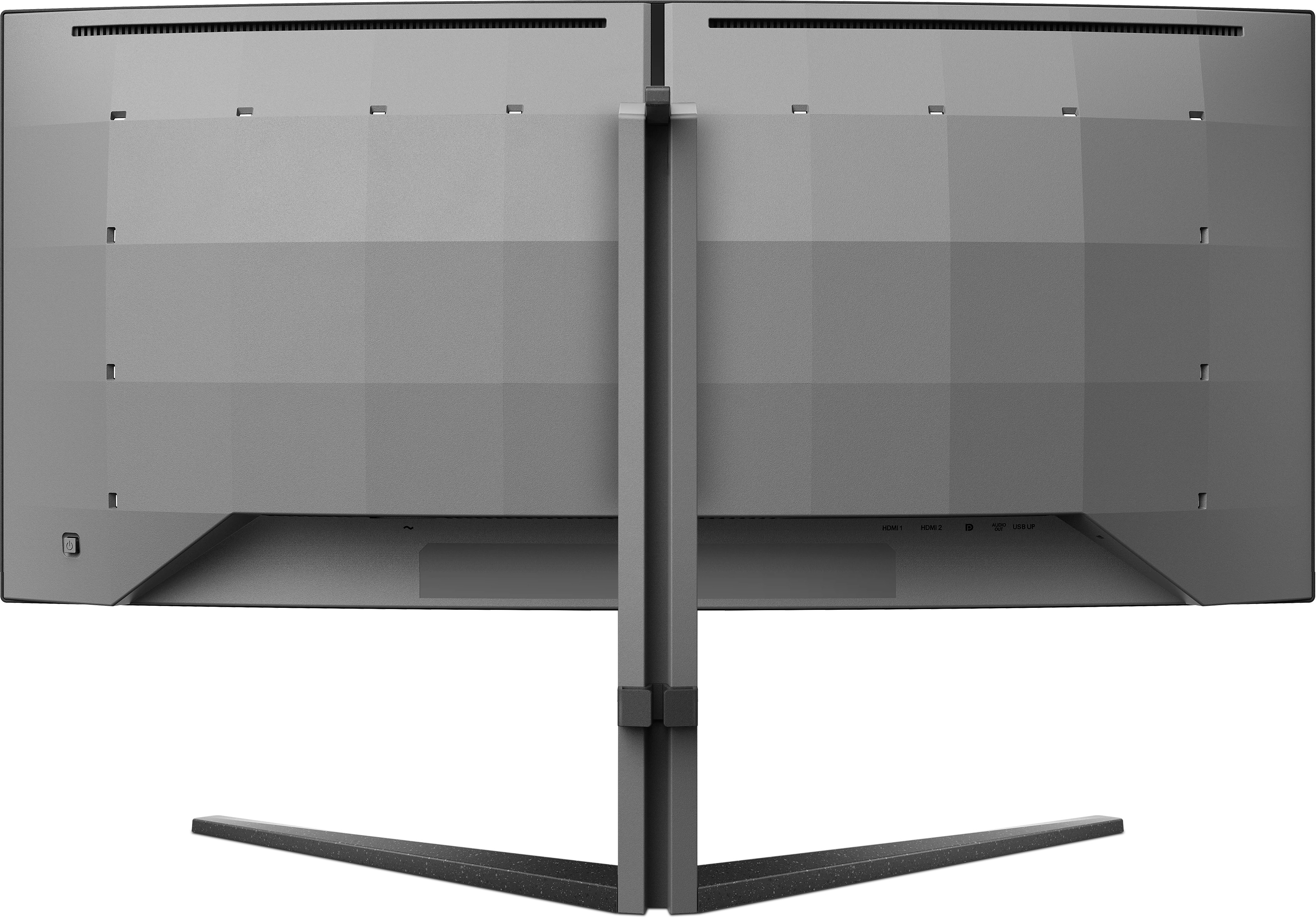 L'arrière d'une configuration à double moniteur est montré. Gris, avec un support et des ports visibles. Le fond est noir.
